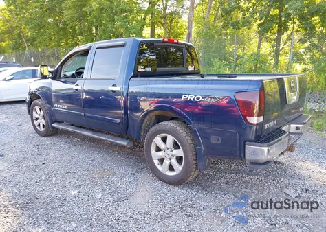2010 Nissan Titan Le z USA, uszkodzony, nr VIN 1N6AA0EC0AN318044